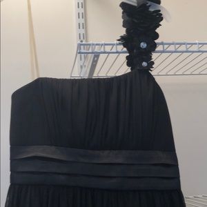 One shoulder, black cocktail dress.